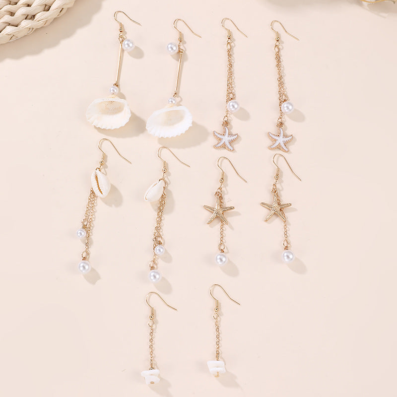 Pendientes largos de borla con colgante minimalista de estrella de mar y concha marina para niñas hechos de resina plástica