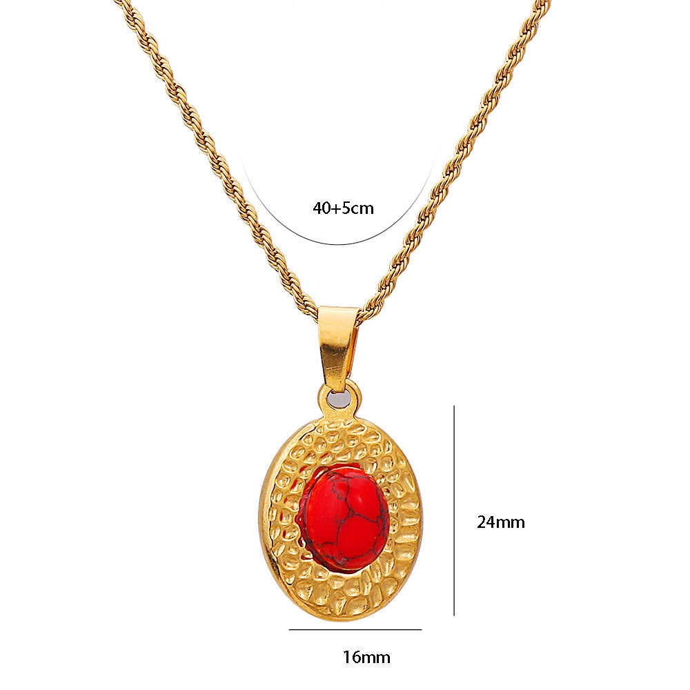 Collana da donna vintage in acciaio inossidabile stile francese con intarsio turchese e ciondolo rotondo in rilievo su catena ritorta