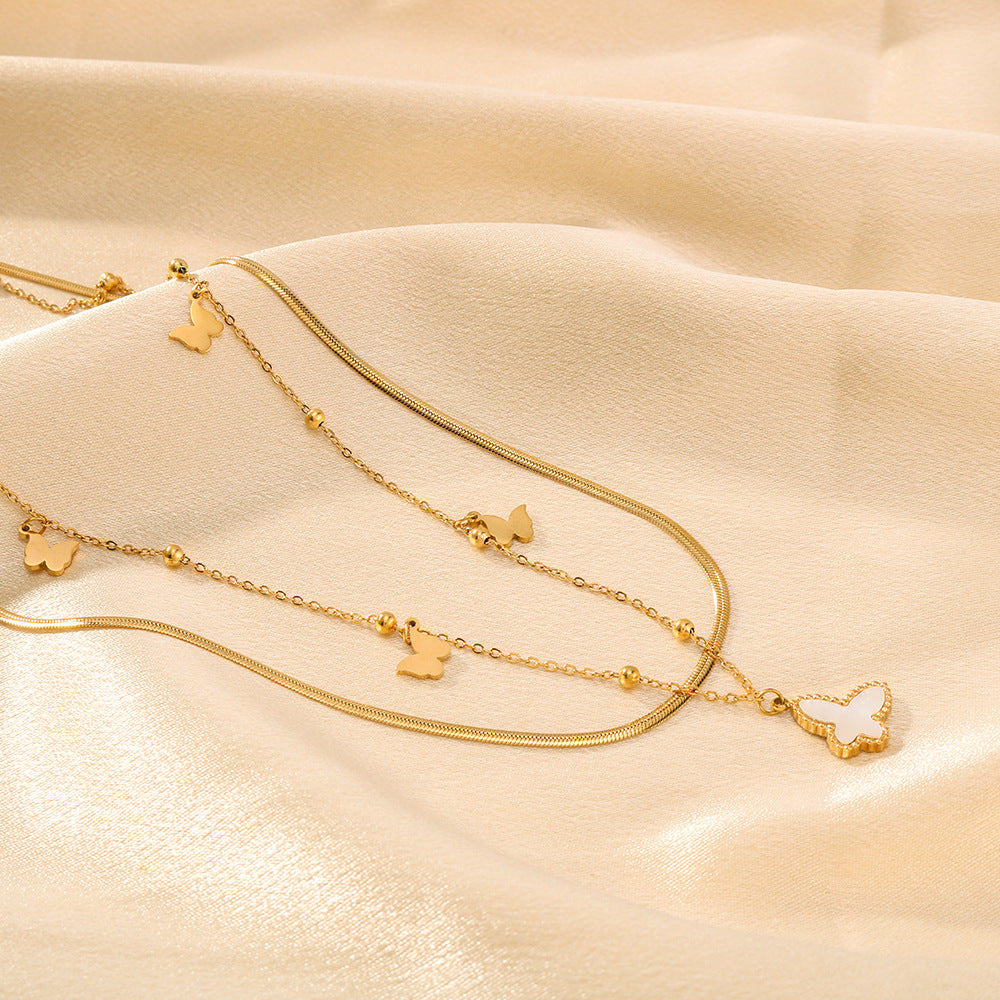 Collana Farfalla Minimalista a Doppio Strato con Catena in Acciaio Inossidabile e Ciondolo in Abalone Bianco