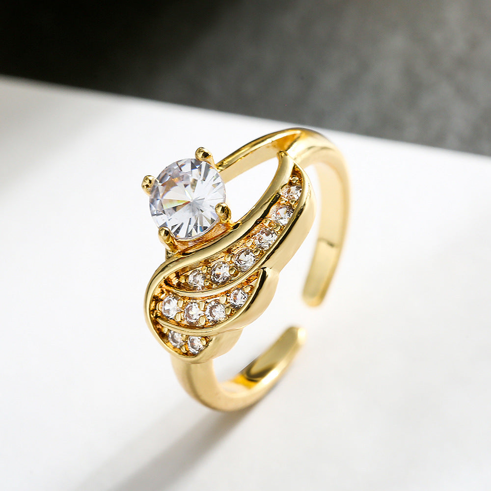 Anello da donna minimalista geometrico a forma di ala in rame con zirconia a micro-pavé