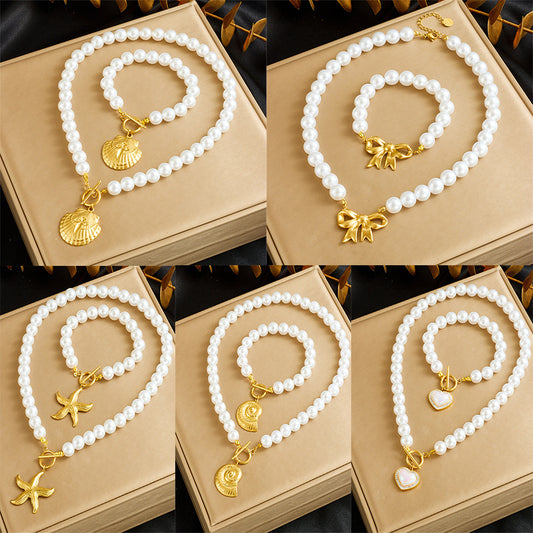 Set collana e bracciale con stella marina a conchiglia in acciaio inossidabile placcato oro con catena di perle vintage francesi e chiusura a T