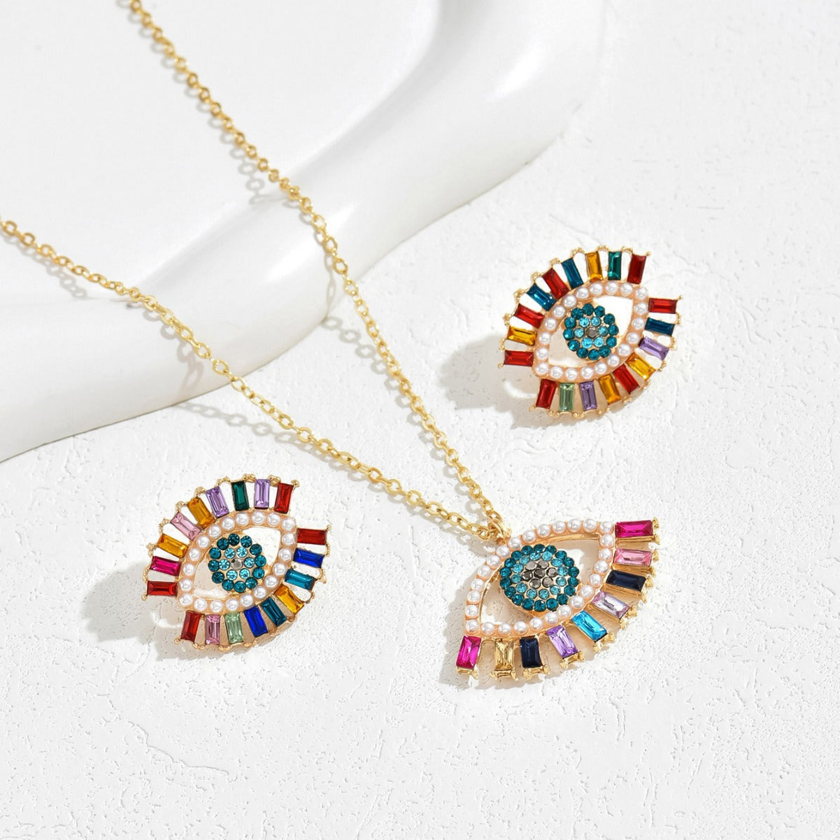 Juego de collar con colgante de ojo de ángel de estilo hip hop minimalista y pendientes de tuerca para mujer, aleación con incrustaciones de diamantes de imitación