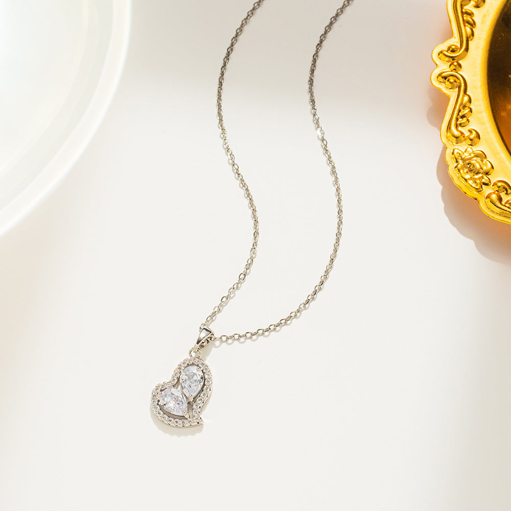 Collana minimalista di lusso in acciaio al titanio a forma di cuore con ciondolo a pavé di zirconi e catena a O placcata in oro 18 carati