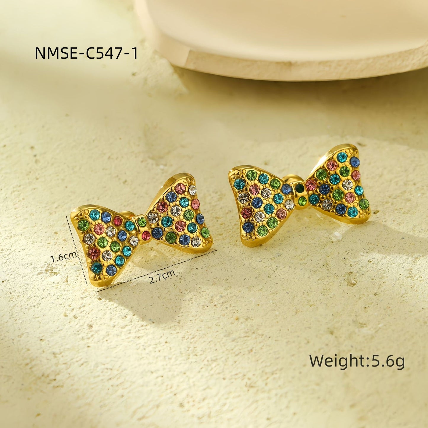 Elegante conjunto de pendientes y collar con forma de lazo de acero de titanio con incrustaciones de pedrería colorida para mujer
