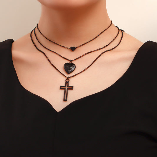 Collar con colgante geométrico de corazón y cruz para mujer con cadena de aleación chapada en negro y diseño que se puede abrir