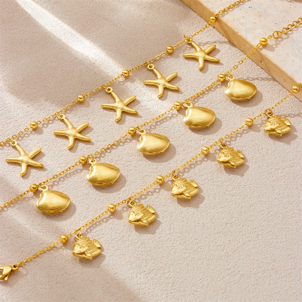 Tropical Ocean Style Gold Plated Stainless Steel Bracelet with Starfish and Tropical Fish Charms for Women