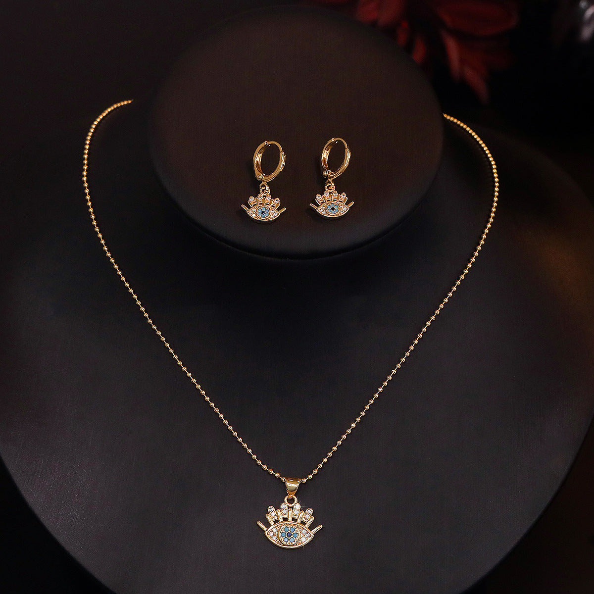 Minimalist Evil Eye Pendant Necklace and Earrings Set in Copper with 18K Gold Plating and Zircon Inlay