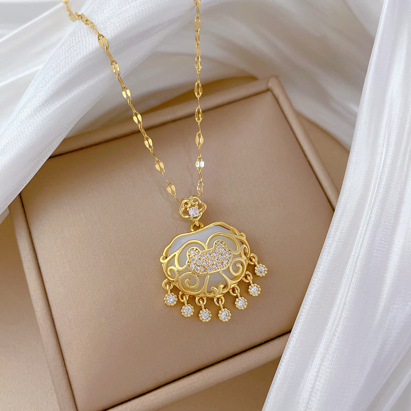 Luxury Tassel Lucky Lock Pendant Necklace for Women Stainless Steel Chain with Moon Motif Geometric Design