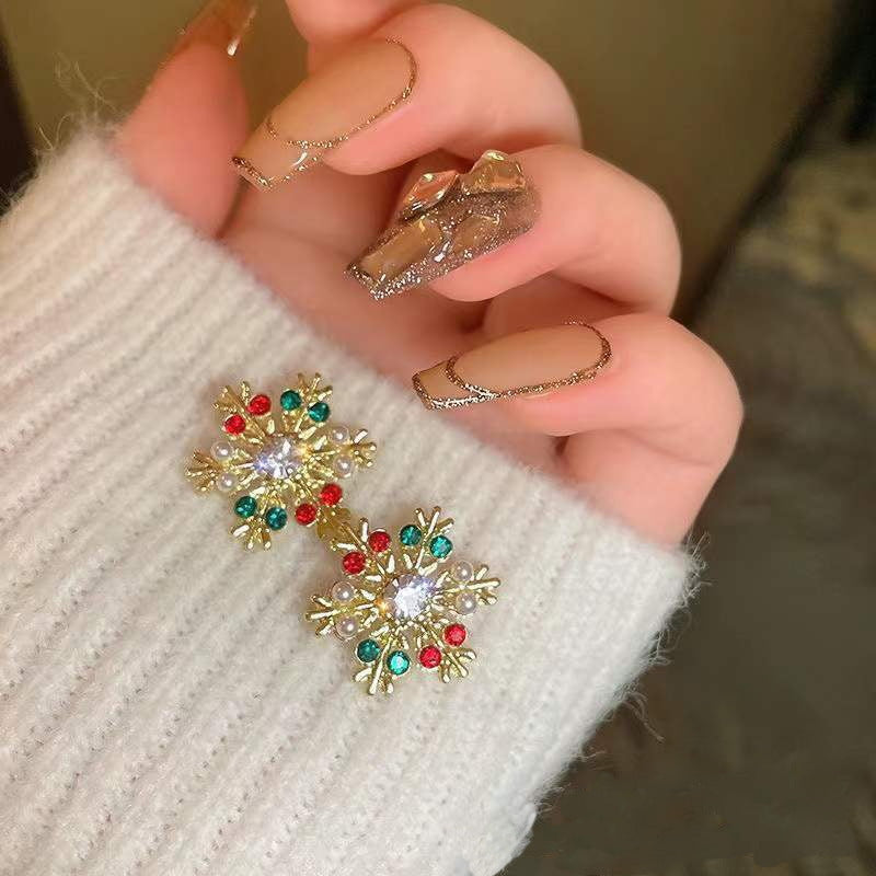 Pendientes de botón de aleación geométrica de copo de nieve de Navidad de moda para mujer con acabado chapado