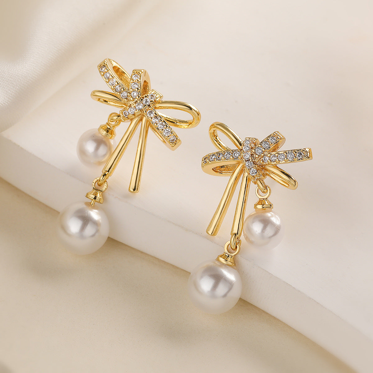 Sweet Bowknot Butterfly Earrings for Women with Copper Base Plated in Real Gold Micro-Paved Zirconia and Pearl Accents