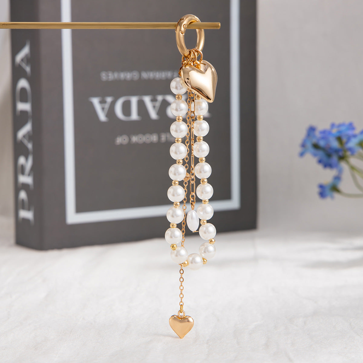 Minimalist Zinc Alloy Heart Pendant with Ceramic Pearl and Tassel Keychain Bag Charm