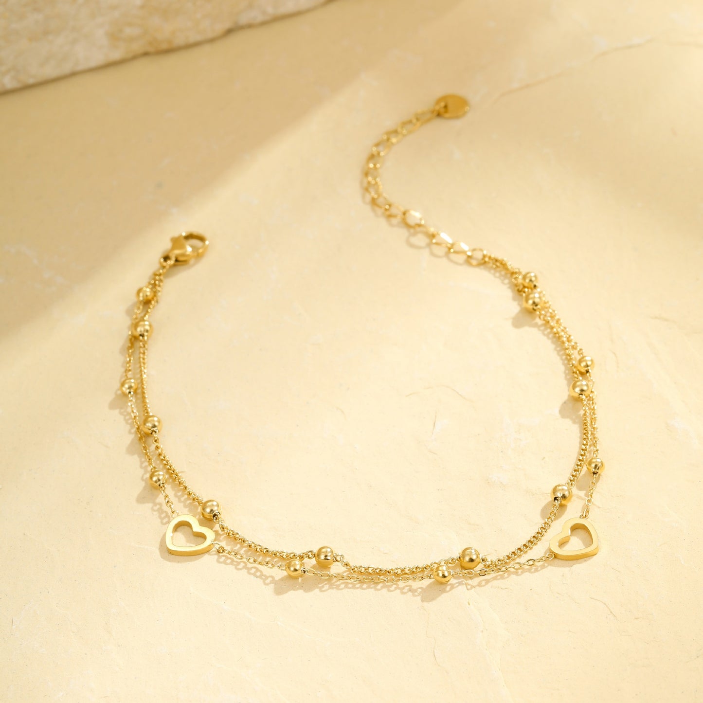 Cavigliera minimalista multistrato in acciaio inossidabile a forma di cuore da donna con design geometrico stile vacanza estiva al mare