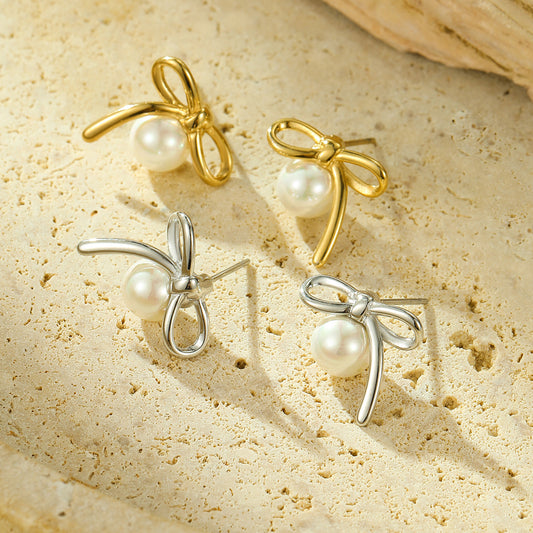 Orecchini a perno da donna a forma di fiocco minimalista in acciaio al titanio con intarsio di perle, ipoallergenici e resistenti allo sbiadimento
