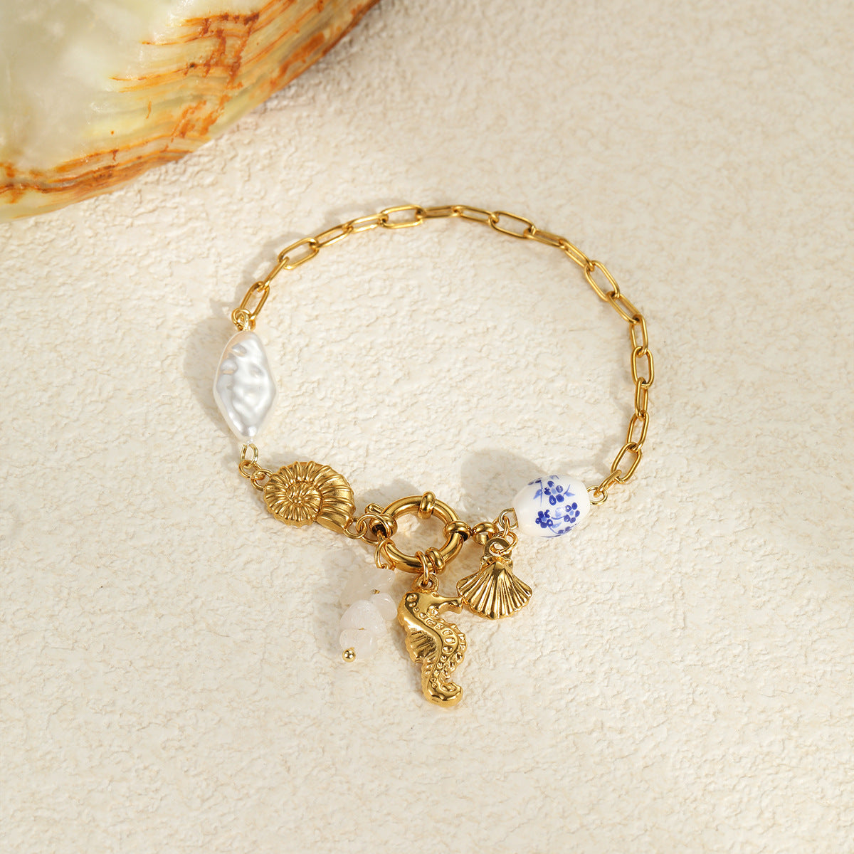 Fashionable Ocean Vacation Style Seashell and Shell Shaped Stainless Steel Bracelet with Geometric Design and Plated Finish for Women