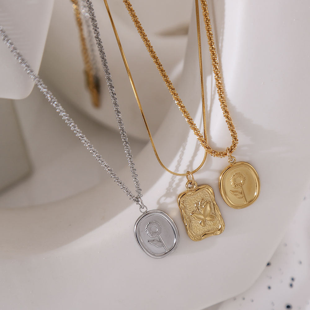 Collana con pendente a forma di girasole in stile vintage francese, in acciaio al titanio con finitura placcata, catena ondulata, elegante gioiello a strati per donna
