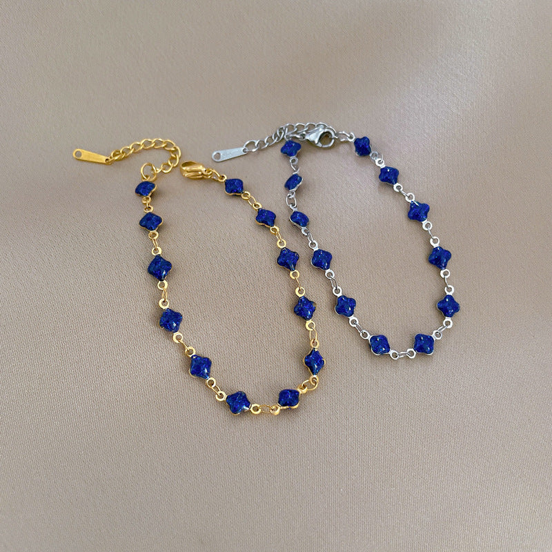 Minimalist Lucky Clover Blue Titanium Steel Bracelet for Women with Gold Plating and Wavy Texture