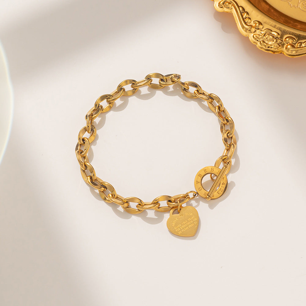 Bracciale a catena a O in acciaio al titanio alla moda da donna con forma a cuore e placcatura in rodio, versatile per l'ufficio