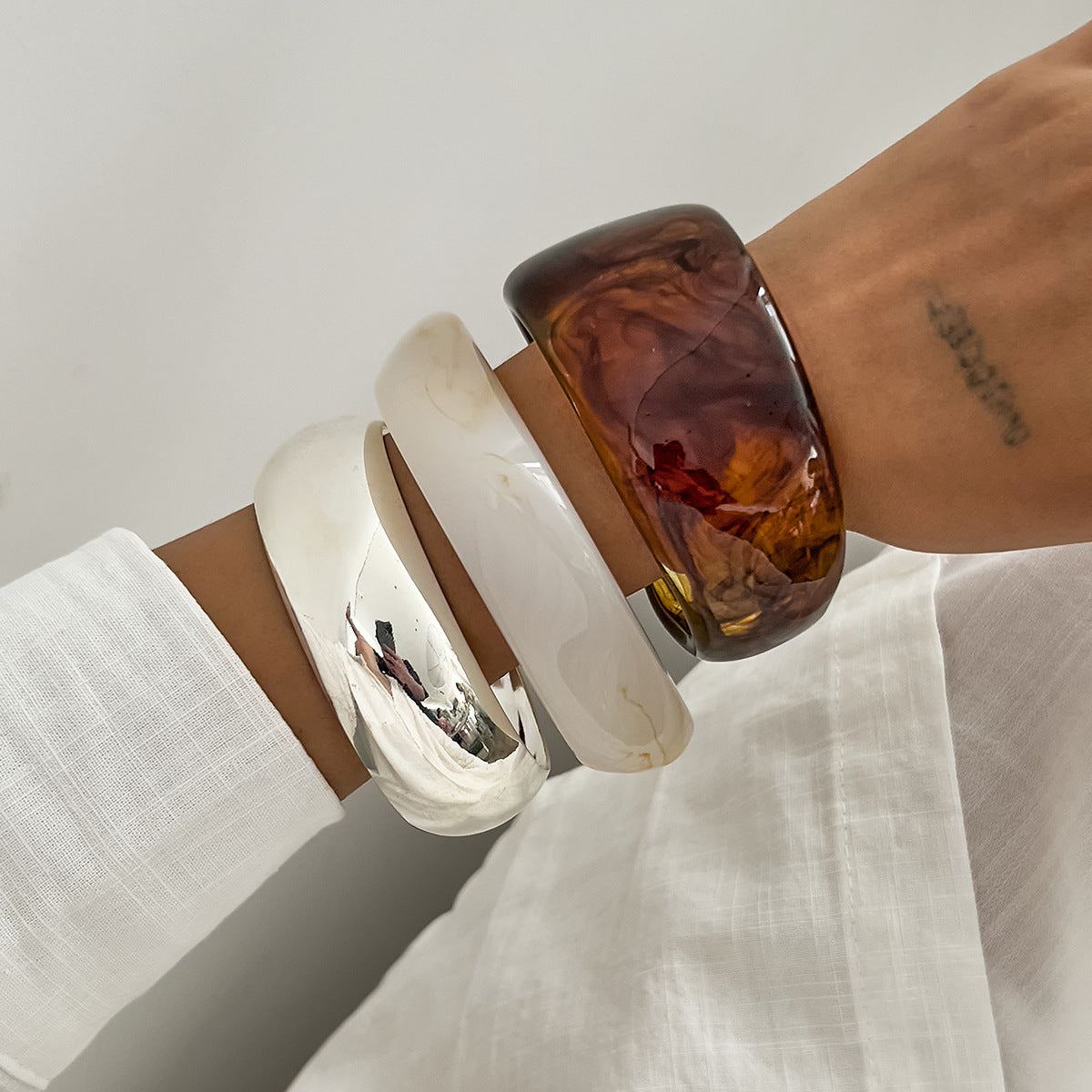 Irregular Marbled Resin Wide-Band Mirror-Finish Retro Bracelet for Women with Plated Finish
