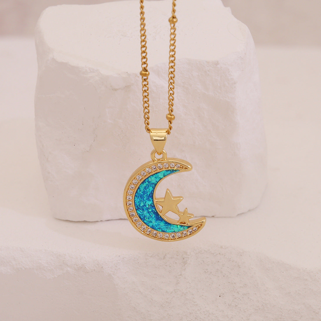 Collana pendente minimalista a stella e luna con rame placcato oro rosa, occhio d'angelo e design a rosa floreale