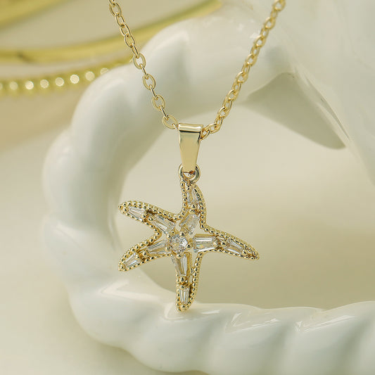 Collar con colgante de estrella de mar minimalista para mujer de cobre con baño de oro de 18 quilates e incrustaciones de circonitas