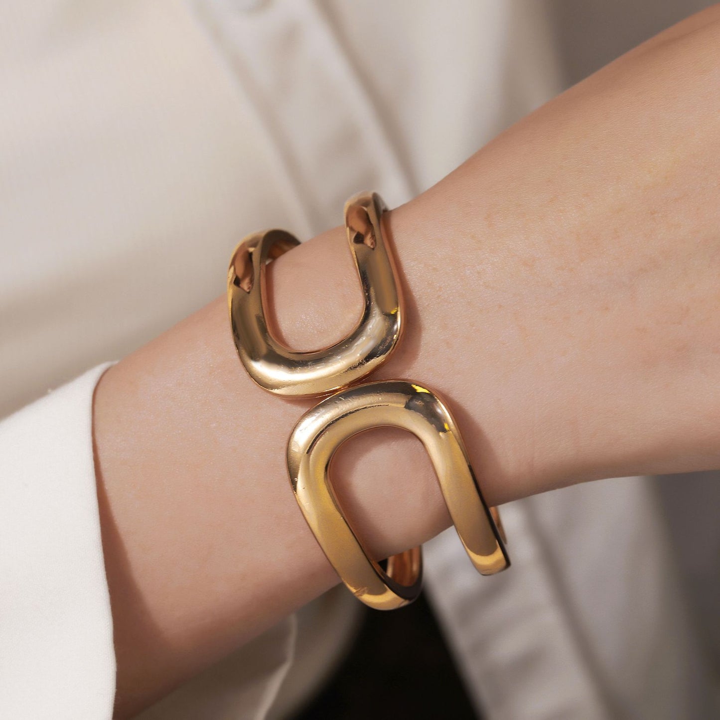 Minimalist Cool-Tone Alloy Bracelet with Hollow Double Circular Arc Design Spring-Opening Bangle for Women