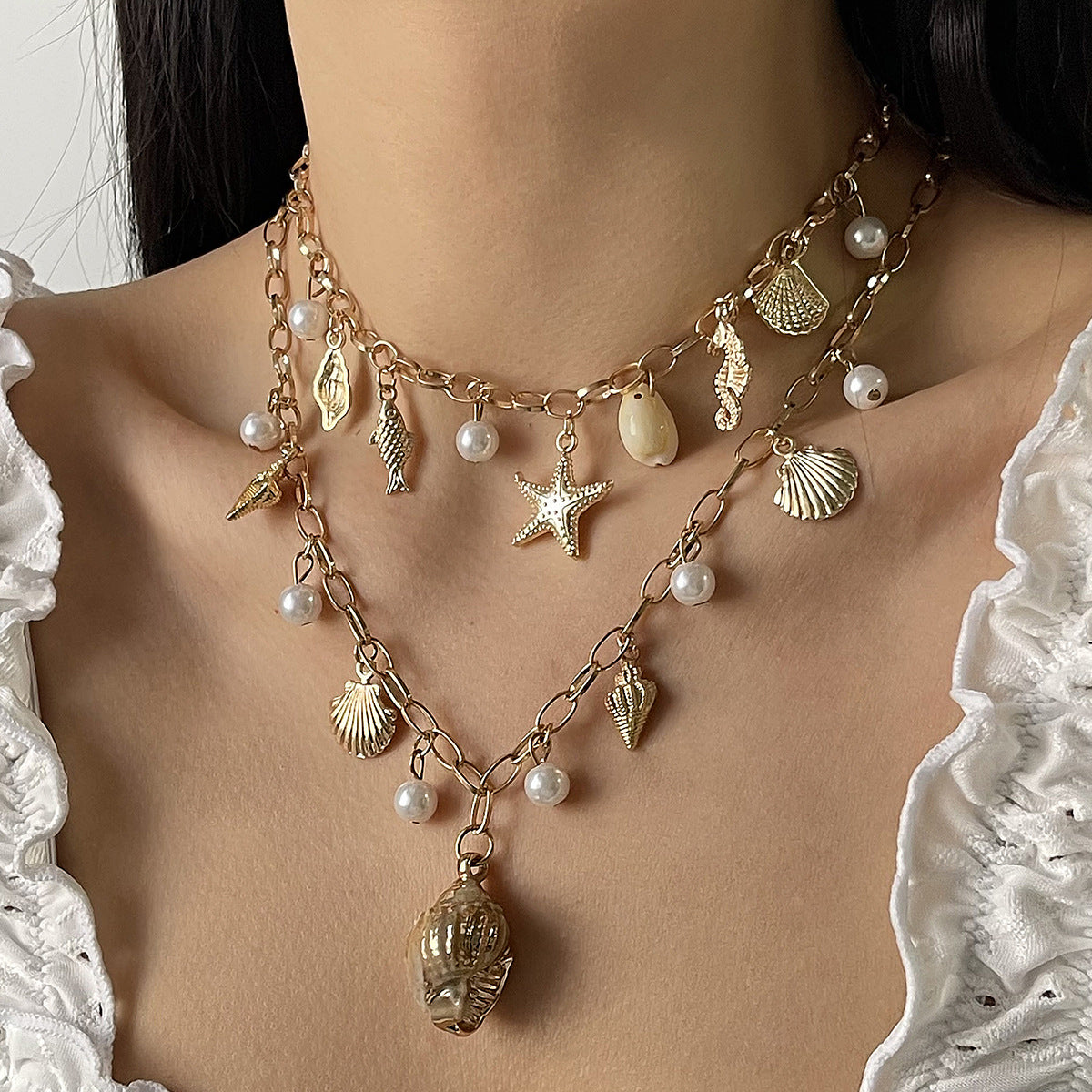 Collar con colgante geométrico estilo vacaciones con borlas de perlas y detalles de estrellas y conchas marinas en aleación con acabado chapado