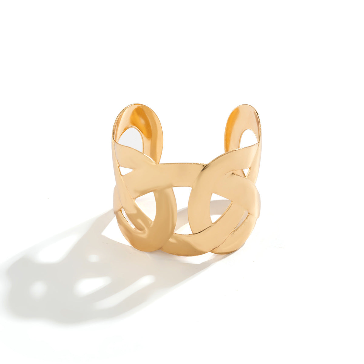 Bracciale a fascia aperta asimmetrico minimalista con design geometrico intagliato in metallo placcato
