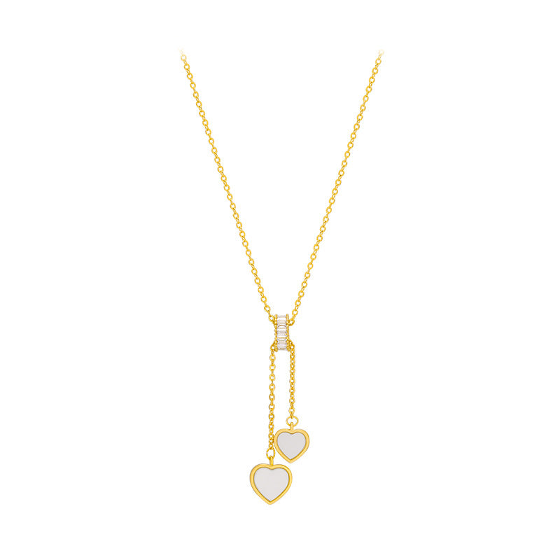 Elegante collana a pendente con cuore in conchiglia per donne con rame placcato e dettaglio a nappina su catena a maglie ovali