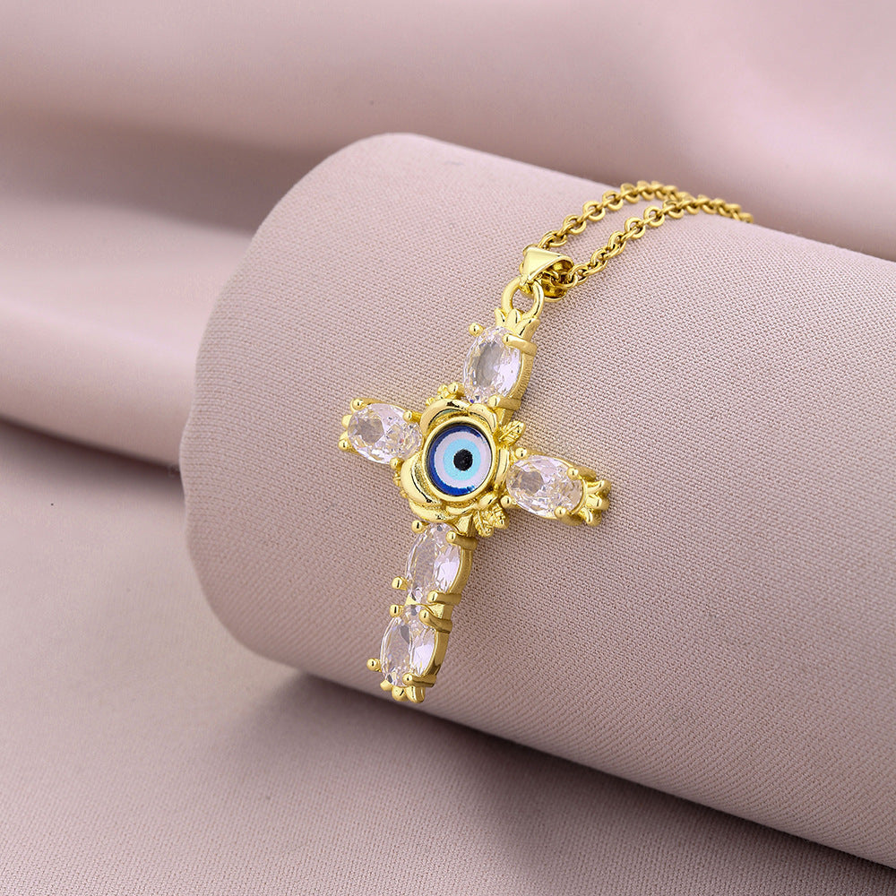 Collana pendente a croce minimalista da donna in rame con placcatura in oro e cristalli di zircone colorati su catena piatta a croce