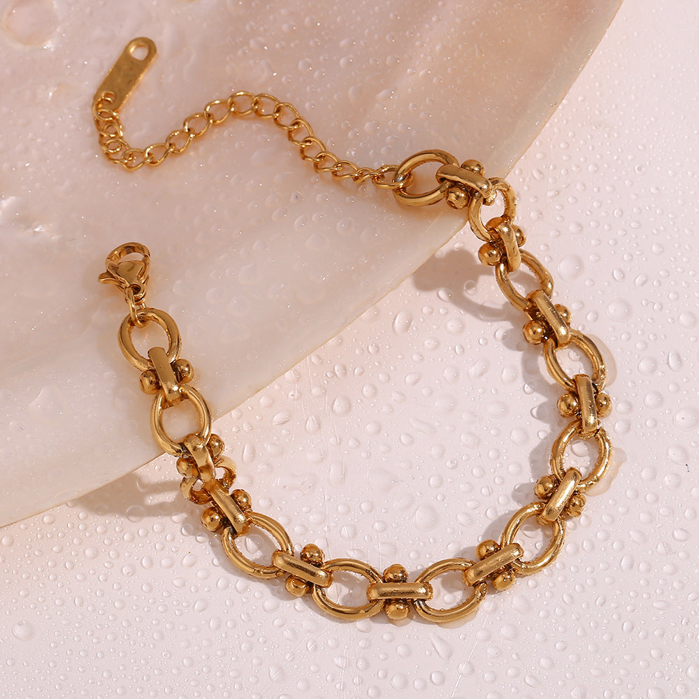 Pulsera de acero inoxidable chapada en oro de 18 quilates con diseño floral ovalado minimalista y elegante, hecha a mano para mujer