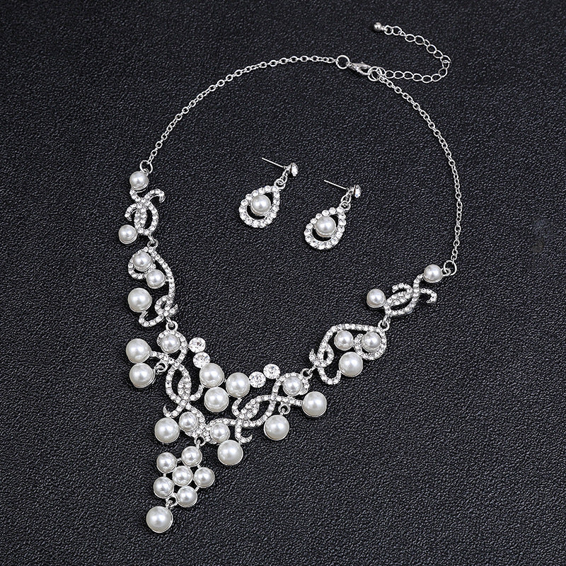 Elegante set collana e orecchini con perle e fiori per donna, pendente a forma di goccia con fiore in lega placcato oro