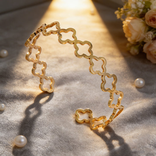 Elegant 18K Gold Plated Stainless Steel Hollow Four-Leaf Clover Cuff Bracelet