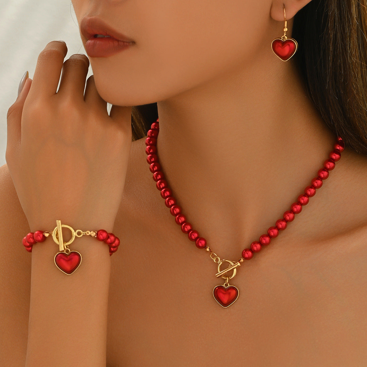 Conjunto de collar, pendientes y pulsera de aleación con perlas de corazón geométrico para mujer