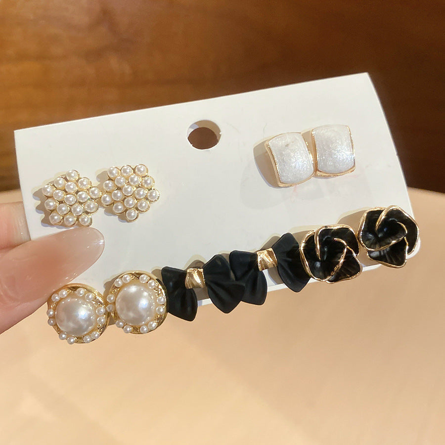 Orecchini a perno eleganti retrò a forma di fiocco con intarsio di strass e perni in acciaio per donna