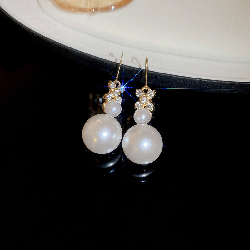 Elegante juego de collar redondo de perlas florales con incrustaciones de circonita para mujer, incluye pendientes, pulsera y cadena de clavícula
