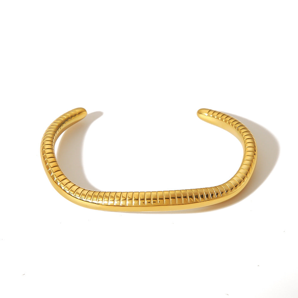 Geometric C-Shaped Irregular Titanium Steel Bracelet for Women with Snake Print Pattern and 18K Vacuum Plating Finish