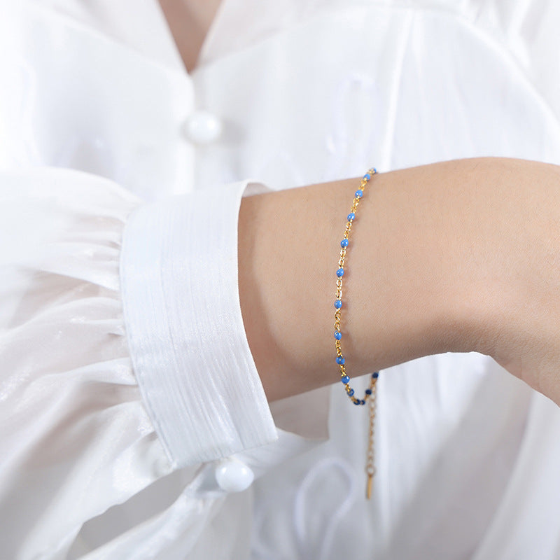 Conjunto minimalista de collar y pulsera de cadena con eslabones O de acero de titanio y detalles de esmalte para mujer
