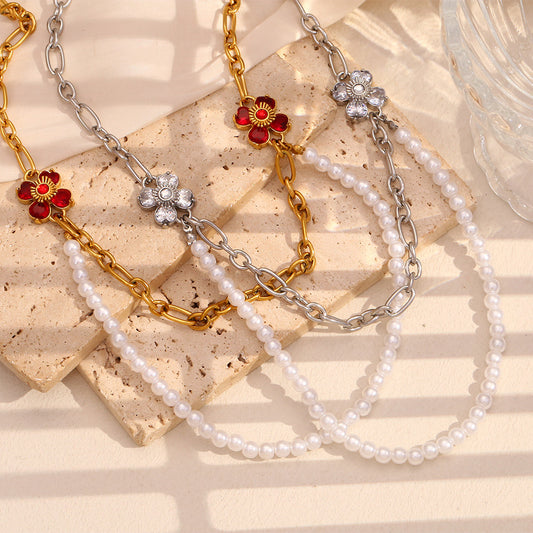 Elegante collana con ciondolo a forma di fiore in acciaio inossidabile placcato oro 18 carati e perle d'imitazione da donna