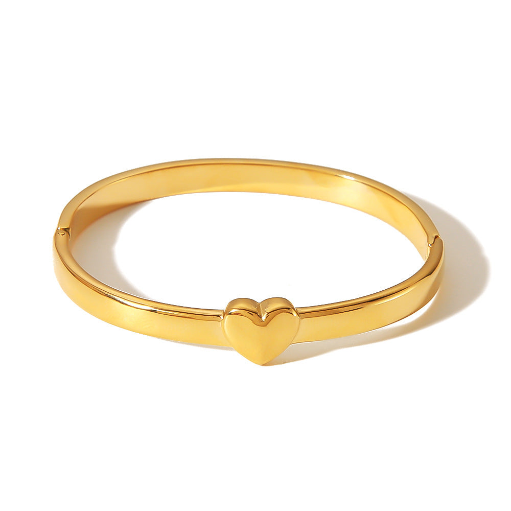 Bracciale minimalista a cuore in acciaio inossidabile placcato oro 18 carati, superficie liscia lucida, design contemporaneo versatile