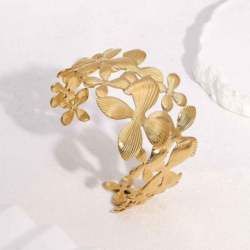 Minimalist 18K Gold Plated Stainless Steel Wide Cuff Bracelet with Lily Flower Design for Women