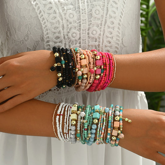 Bracciale da donna in stile bohémien con perline multistrato, perline acriliche colorate e intrecciate con forme geometriche per un abbigliamento casual alla moda