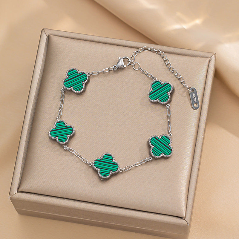 Set di collana, bracciale e orecchini a lobo da donna in acciaio al titanio minimalista con quadrifoglio fortunato