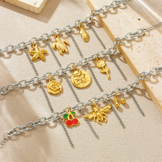 Bracciale unico in acciaio inossidabile color-block con ciondoli a forma di ape, fiore, stella marina e ciliegia