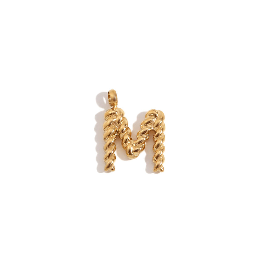 Colgante minimalista de acero inoxidable chapado en oro de 18 quilates con mini letra retorcida para mujer