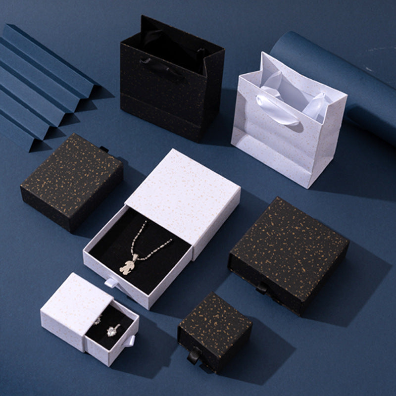 Pearlescent Black and White Jewelry Box with Gold Accent Drawer Style for Earrings Rings Necklaces and Bracelets