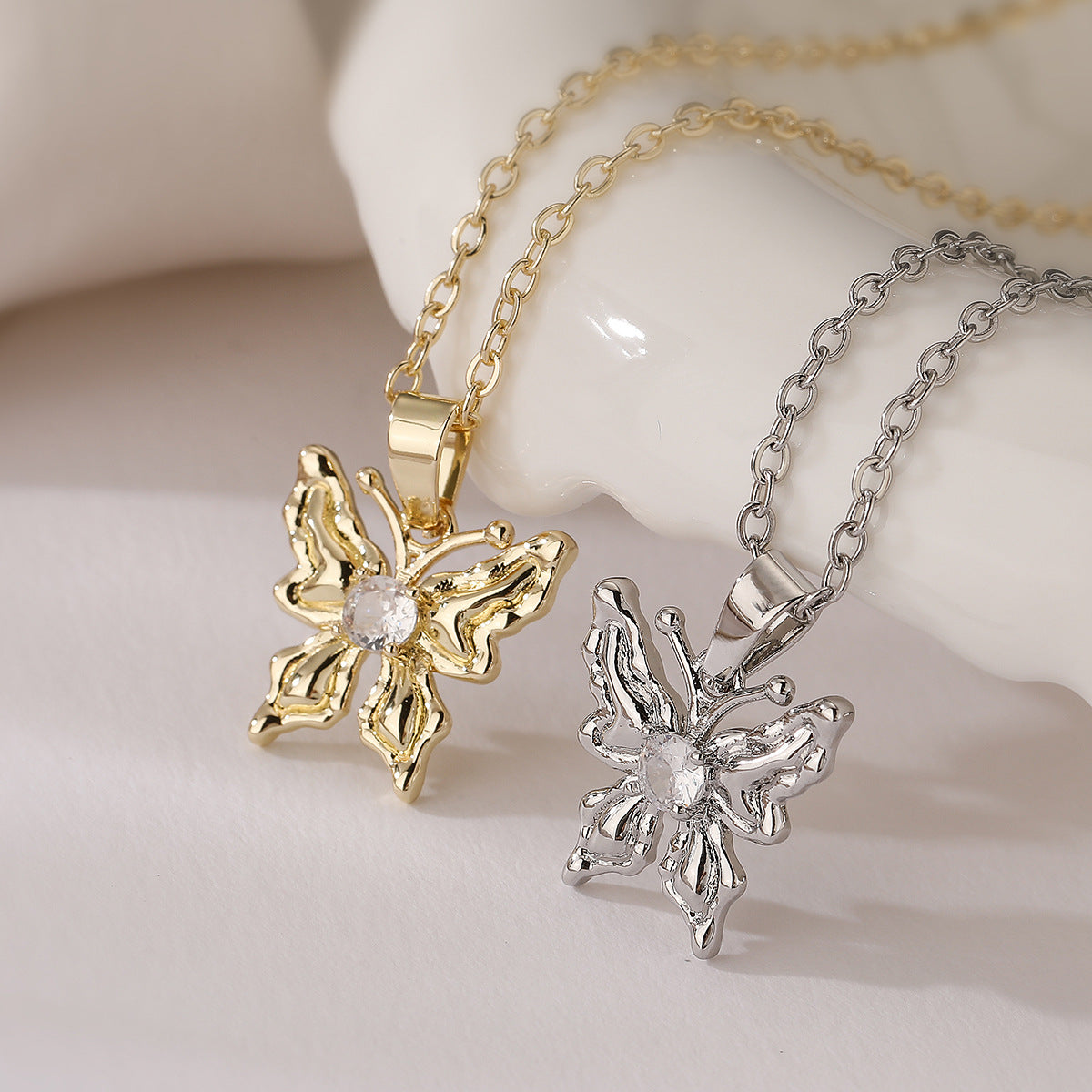 Minimalist Butterfly Pendant Necklace for Women Made of Brass with Rhinestone Inlay and Gold Plating