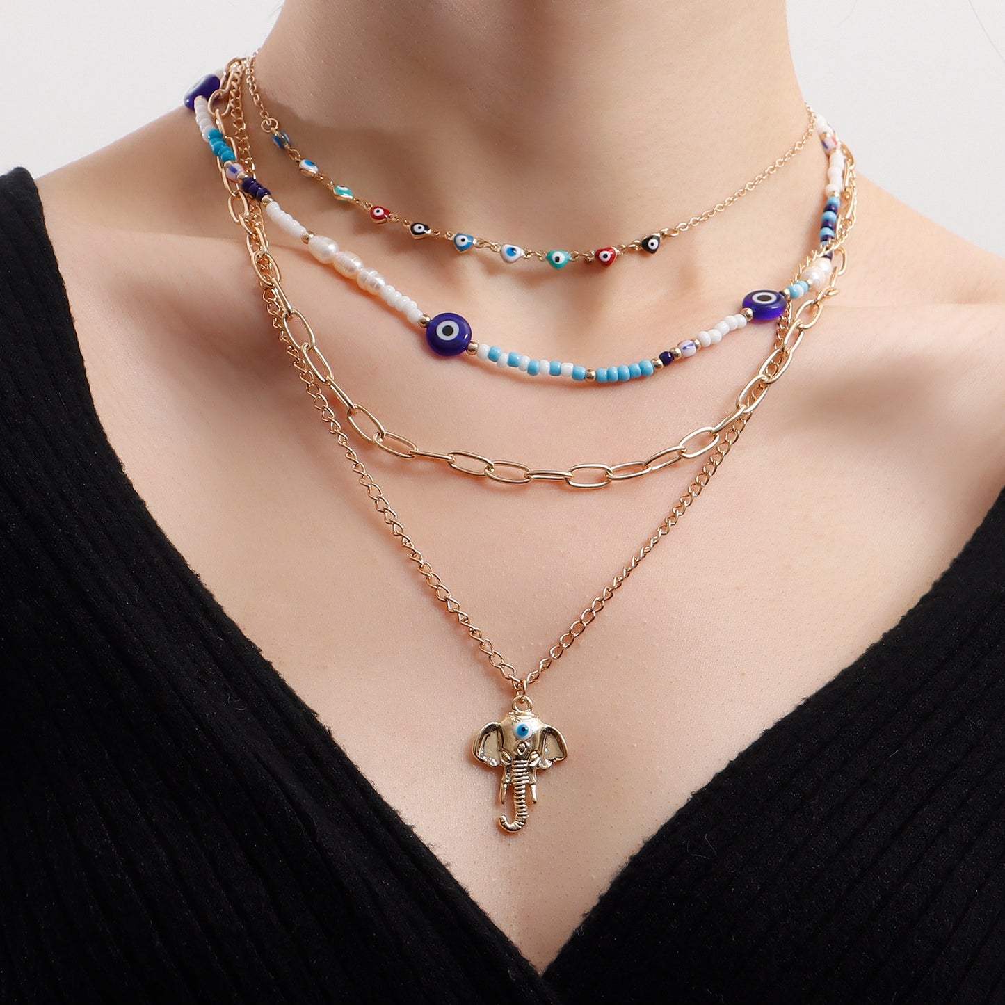 Bohemian Multi-Layer Heart-Shaped Evil Eye Beaded Necklace for Women with Alloy Pendant and Plated Finish