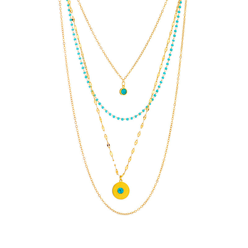 Collana con Pendente Minimalista Geometrica Irregolare in Acciaio al Titanio con Intarsio Turchese e Finitura Placcata per Donne
