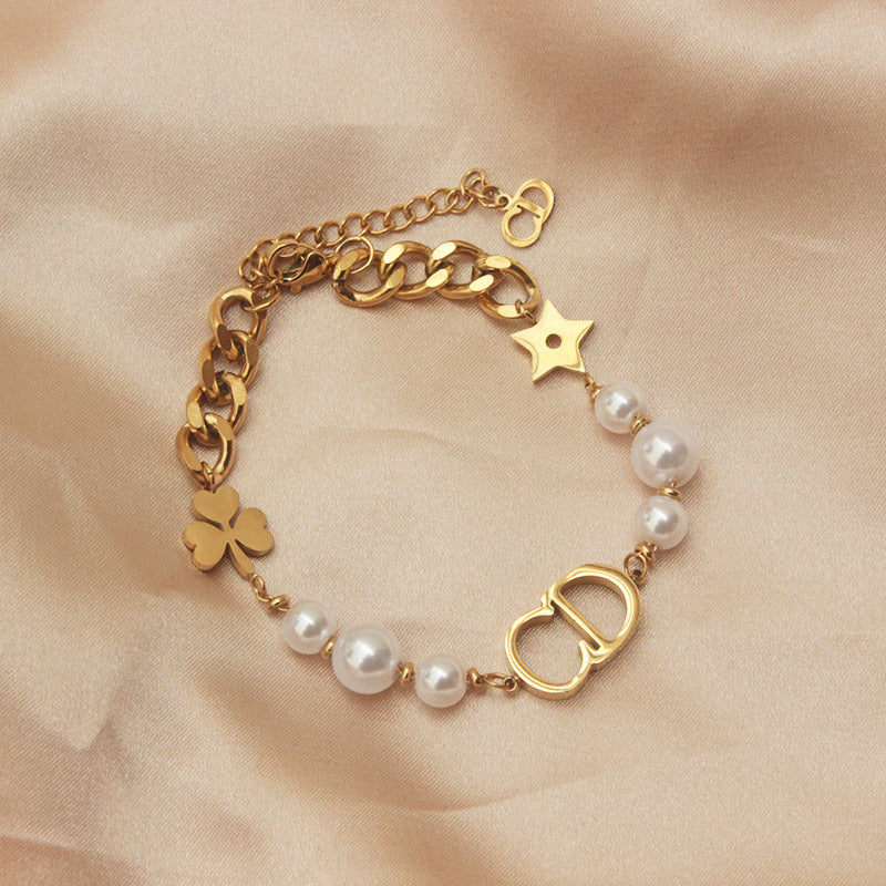 Sweet Minimalist Titanium Steel Bracelet with Gold Plated CD Star and Leaf Charms for Women