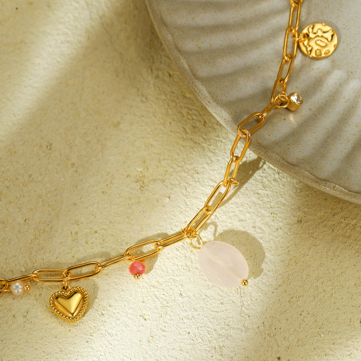 Fashionable Heart-Shaped Titanium Steel Necklace for Women with Natural Pearl Accents and Electroplated Finish